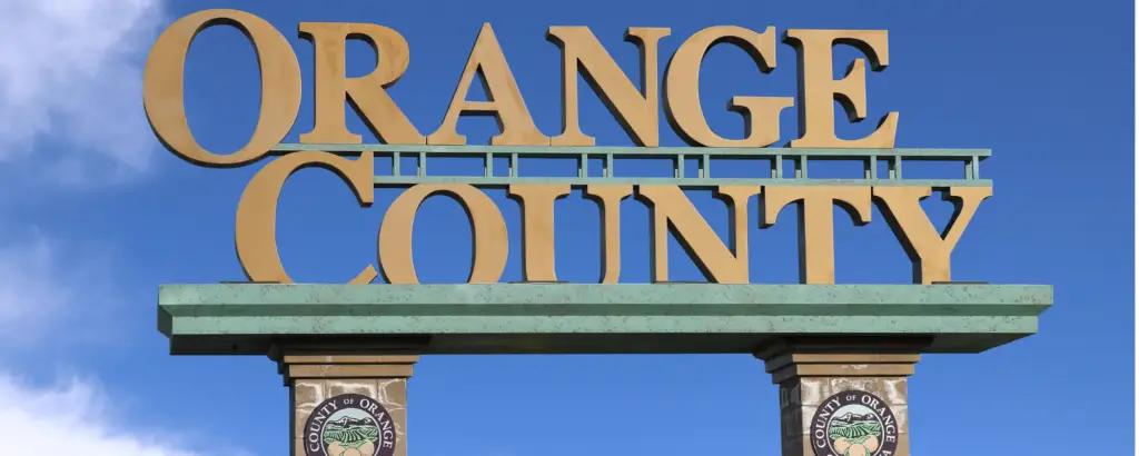 Discover Orange County! This sign welcomes visitors as they enter Orange County.